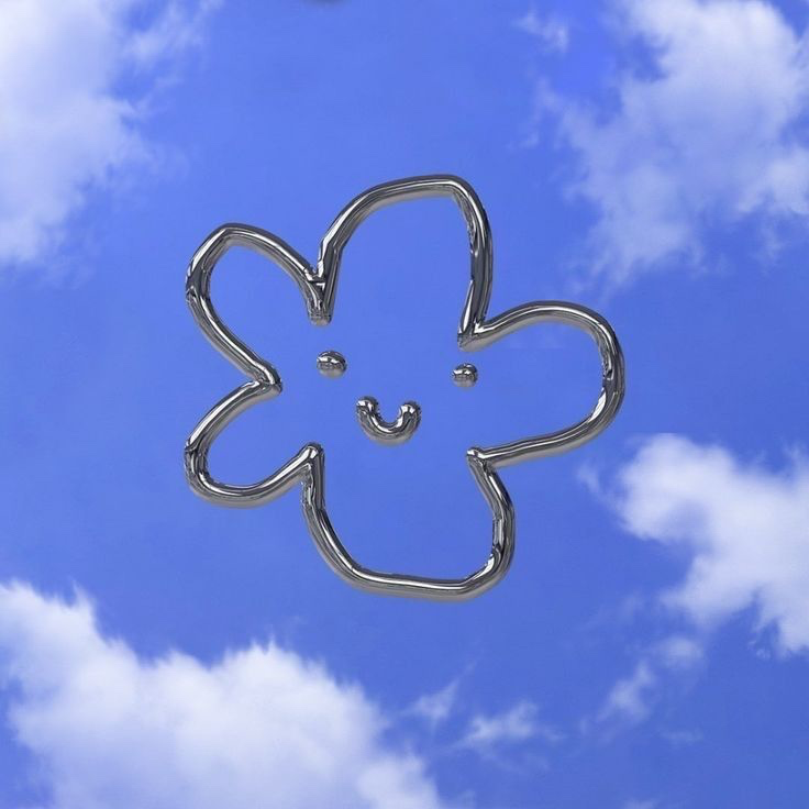 A smiling chrome flower floating in a bright blue sky with soft white clouds