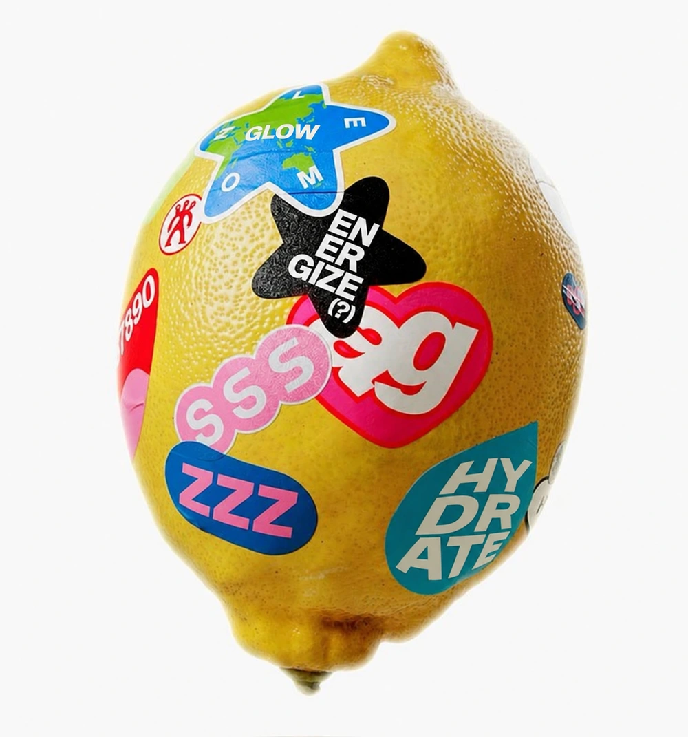 Afterglow text-edit study on the reference lemon’s original sticker arrangement
